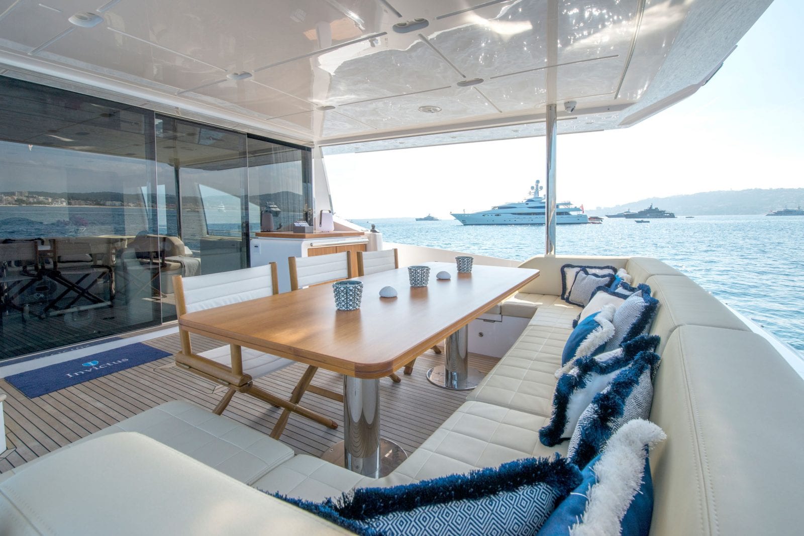 table with seating on back side of yacht